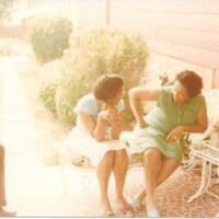 simms00061-women-chatting-on-a-porch.jpg